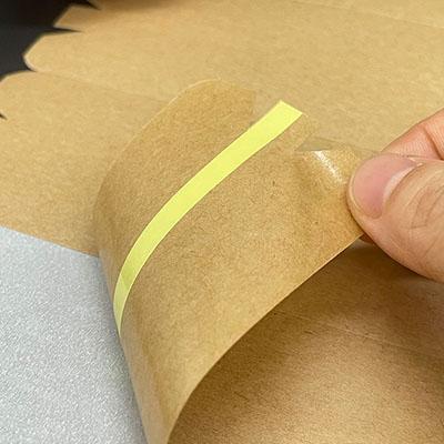 Brown kraft paper tape with easy tear handle for carton